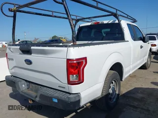 2015 Ford F-150 XL with VIN 1FTEX1C89FFC78555, listed as a IAAI auction lot 41989102 with 216,655 mi miles. Bid and sale history available at carsss.com. Image 4.