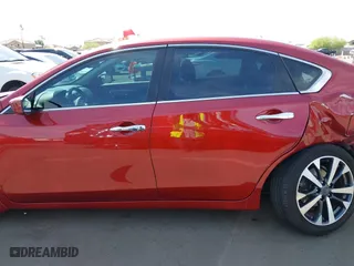 2016 Nissan Altima 2.5 SL with VIN 1N4AL3AP4GC122089, listed as a IAAI auction lot 41965851 with 121,608 mi miles. Bid and sale history available at carsss.com. Image 15.