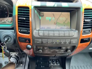 2004 Lexus GX 470 z VIN JTJBT20X940060144, wystawiony jako Copart lot #60893715 z przebiegiem 303 468 mil mil oraz Czysty tytuł • Clean title. Historia ofert i sprzedaży dostępna na DreamBid. Obrazek 9.