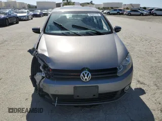 2014 Volkswagen Golf TDI w/Sunroof & Nav z VIN WVWNM7AJ2EW006137, wystawiony jako Copart lot #57031715 z przebiegiem 136 654 mil mil oraz Szkoda całkowita • Salvage title. Historia ofert i sprzedaży dostępna na DreamBid. Obrazek 5.