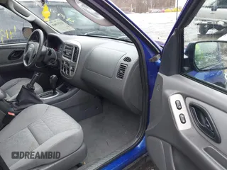 2005 Ford Escape XLT with VIN 1FMCU93125KA41795, listed as a IAAI auction lot 41931869 with 156,421 mi miles and . Bid and sale history available at DreamBid. Image 5.