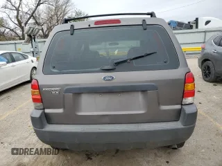 2002 Ford Escape XLS Choice with VIN 1FMYU02102KB67376, listed as a Copart auction lot 79109394 with 234,306 mi miles and Salvage title. Bid and sale history available at DreamBid. Image 6.