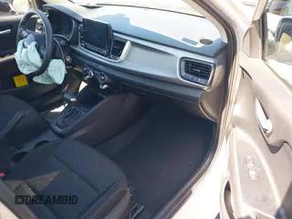 2023 Kia Rio S z VIN 3KPA24AD4PE592446, wystawiony jako IAAI lot #42244022 z przebiegiem 13 759 mil mil oraz . Historia ofert i sprzedaży dostępna na DreamBid. Obrazek 5.
