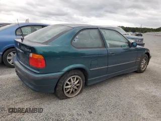 1997 BMW 3 Series 318tiA with VIN WBACG8321VAU39596, listed as a Copart auction lot 72657404 with 0 mi miles and Salvage Title. Bid and sale history available at carsss.com. Image 3.