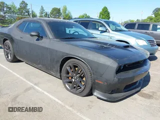 2023 Dodge Challenger GT z VIN 2C3CDZJG2PH610641, wystawiony jako IAAI lot #42052150 z przebiegiem 11 413 mil mil oraz . Historia ofert i sprzedaży dostępna na DreamBid. Obrazek 1.