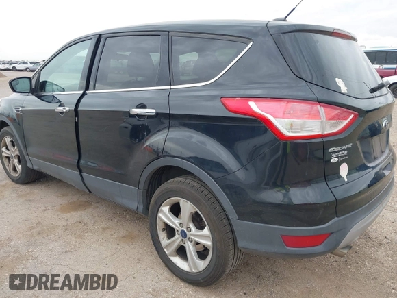2015 Ford Escape SE with VIN 1FMCU9G90FUA54163, listed as a IAAI auction lot 42058788 with 130,623 mi miles. Bid and sale history available at carsss.com. Image 3.