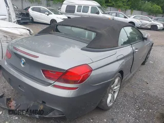 2015 BMW M6 with VIN WBSLZ9C57FD651313, listed as a IAAI auction lot 42375727 with 45,132 mi miles and . Bid and sale history available at DreamBid. Image 4.
