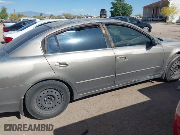 2003 Nissan Altima S with VIN 1N4AL11D73C163112, listed as a IAAI auction lot 42084672 with 184,140 mi miles and . Bid and sale history available at DreamBid. Image 14.