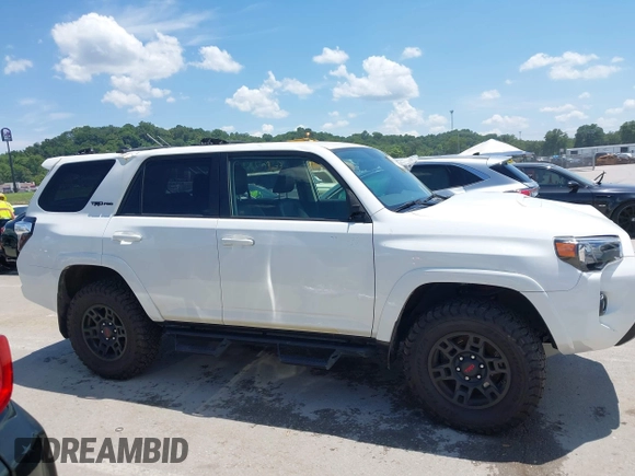 2018 Toyota 4Runner SR5 with VIN JTEBU5JRXJ5595186, listed as a IAAI auction lot 42607713 with 83,592 mi miles and . Bid and sale history available at DreamBid. Image 14.
