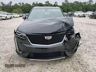 2023 Cadillac XT6 AWD Sport z VIN 1GYKPGRS6PZ126039, wystawiony jako Copart lot #55948605 z przebiegiem 39 966 mil mil oraz Szkoda całkowita • Salvage title. Historia ofert i sprzedaży dostępna na DreamBid. Obrazek 14.