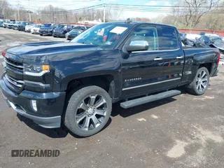 2018 Chevrolet Silverado 1500 with VIN 1GCVKSEC3JZ125571, listed as a IAAI auction lot 41982881 with 58,410 mi miles and . Bid and sale history available at DreamBid. Image 18.