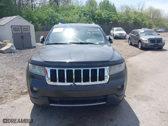 2011 Jeep Grand Cherokee Limited with VIN 1J4RR5GT4BC631789, listed as a IAAI auction lot 42088795 with 115,494 mi miles. Bid and sale history available at carsss.com. Image 12.