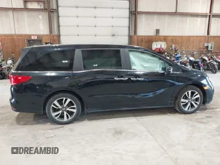 2021 Honda Odyssey Touring z VIN 5FNRL6H83MB028264, wystawiony jako IAAI lot #42206204 z przebiegiem 45 332 mil mil oraz . Historia ofert i sprzedaży dostępna na DreamBid. Obrazek 13.