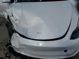 2022 Tesla Model Y Performance с VIN 7SAYGDEF2NF405596, выставлен на аукционе Copart как лот 52868195 с пробегом Не указан миль и Списание • Salvage title. История ставок и продаж доступна на DreamBid. Изображение 14.