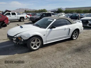 2003 Ford Mustang GT Deluxe z VIN 1FAFP45X43F399411, wystawiony jako Copart lot #75773104 z przebiegiem 111 446 mil mil oraz Szkoda całkowita • Salvage title. Historia ofert i sprzedaży dostępna na DreamBid. Obrazek 1.