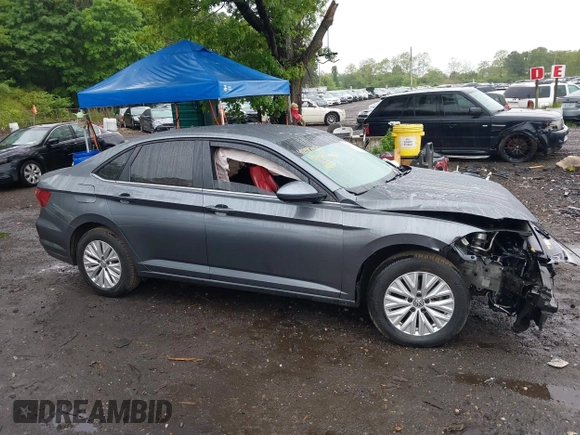 2019 Volkswagen Jetta S z VIN 3VWC57BU7KM232096, wystawiony jako IAAI lot #42317927 z przebiegiem 98 615 mil mil oraz . Historia ofert i sprzedaży dostępna na DreamBid. Obrazek 13.
