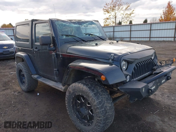 2014 Jeep Wrangler Sahara with VIN 1C4AJWBG5EL247812, listed as a IAAI auction lot 40909884 with 106,475 mi miles and . Bid and sale history available at DreamBid. Image 1.