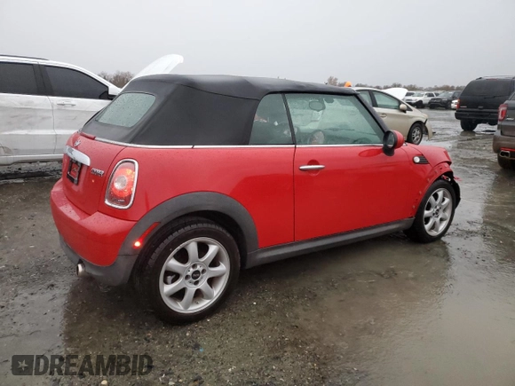 2009 MINI Convertible with VIN WMWMR33539TU96291, listed as a Copart auction lot 83849744 with 65,056 mi miles and Salvage title. Bid and sale history available at DreamBid. Image 3.