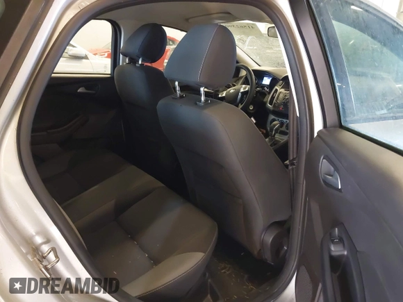 2013 Ford Focus SE z VIN 1FADP3F24DL277767, wystawiony jako IAAI lot #41562390 z przebiegiem 183 322 mil mil oraz . Historia ofert i sprzedaży dostępna na DreamBid. Obrazek 8.