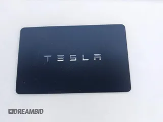 2021 Tesla Model Y Long Range with VIN 5YJYGDEE9MF301903, listed as a IAAI auction lot 42004007 with 26,740 mi miles. Bid and sale history available at carsss.com. Image 11.