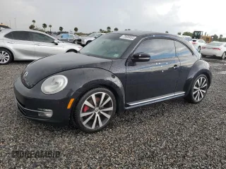 2012 Volkswagen Beetle 2.0T Turbo with VIN 3VWV67AT4CM648669, listed as a Copart auction lot 73939054 with 0 mi miles and Salvage Title. Bid and sale history available at carsss.com. Image 1.