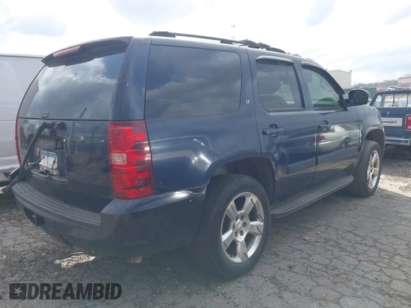 2007 Chevrolet Tahoe LTZ with VIN 1GNFC13J37R145736, listed as a IAAI auction lot 41724845 with 290,931 mi miles and . Bid and sale history available at DreamBid. Image 4.