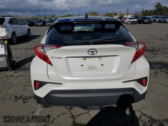 2020 Toyota C-HR LE with VIN JTNKHMBX7L1077252, listed as a Copart auction lot 51486305 with 64,213 mi miles and Salvage Title. Bid and sale history available at DreamBid. Image 6.