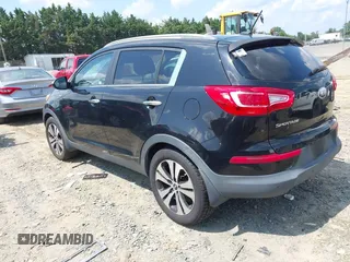 2013 Kia Sportage EX with VIN KNDPCCA21D7457355, listed as a IAAI auction lot 42694813 with 155,879 mi miles and . Bid and sale history available at DreamBid. Image 3.