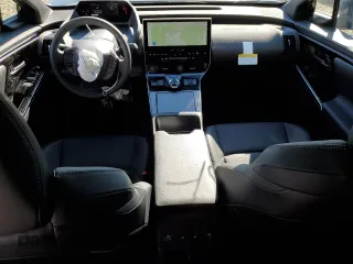 2023 Subaru Solterra Premium с VIN JTMABABA9PA022349, выставлен на аукционе Copart как лот 73167143 с пробегом 1 199 миль миль и . История ставок и продаж доступна на DreamBid. Изображение 8.