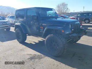 2008 Jeep Wrangler Sahara with VIN 1J4FA54108L543764, listed as a IAAI auction lot 41867734 with 186,145 mi miles and . Bid and sale history available at DreamBid. Image 1.