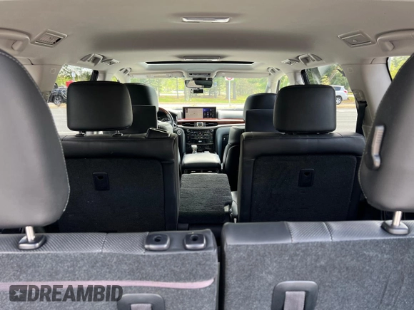 2018 Lexus LX 570 with VIN JTJHY7AX8J4258452, listed as a Copart auction lot 57357365 with 131,556 mi miles and Clean title. Bid and sale history available at DreamBid. Image 9.