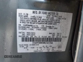 2008 Ford Taurus Limited with VIN 1FAHP28W08G161766, listed as a IAAI auction lot 41809990 with 244,959 mi miles. Bid and sale history available at carsss.com. Image 9.