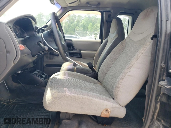 2001 Ford Ranger XL z VIN 1FTYR14U91PA04178, wystawiony jako Copart lot #57509025 z przebiegiem 188 269 mil mil oraz Czysty tytuł • Clean title. Historia ofert i sprzedaży dostępna na DreamBid. Obrazek 7.