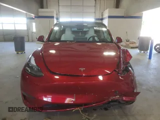 2024 Tesla Model Y Long Range with VIN 7SAYGDEE6RF995069, listed as a Copart auction lot 57085405 with 22,302 mi miles and Salvage title. Bid and sale history available at DreamBid. Image 5.