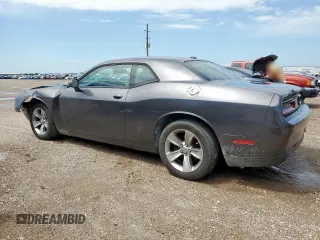 2016 Dodge Challenger SXT with VIN 2C3CDZAGXGH265147, listed as a Copart auction lot 59599185 with 83,671 mi miles and Salvage title. Bid and sale history available at DreamBid. Image 2.