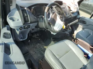 2016 Ford Transit Cargo with VIN 1FTYE1YM5GKA62641, listed as a Copart auction lot 65886804 with 130,906 mi miles and Salvage Title. Bid and sale history available at DreamBid. Image 8.