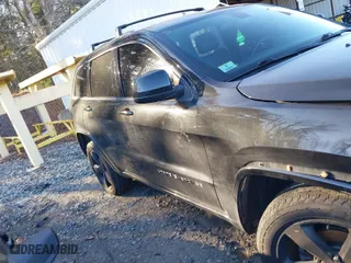 2015 Jeep Grand Cherokee Altitude with VIN 1C4RJFAG6FC796571, listed as a IAAI auction lot 41258471 with 104,049 mi miles. Bid and sale history available at carsss.com. Image 13.