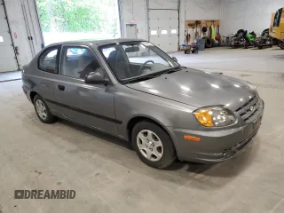 2004 Hyundai Accent z VIN KMHCF35C14U310393, wystawiony jako Copart lot #57840235 z przebiegiem 50 825 mil mil oraz Tytuł czysty. Historia ofert i sprzedaży dostępna na DreamBid. Obrazek 4.