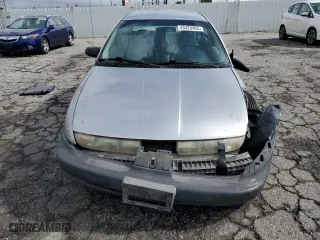 1996 Saturn SL with VIN 1G8ZH5288TZ156412, listed as a Copart auction lot 44429465 with 141,560 mi miles and Salvage Title. Bid and sale history available at carsss.com. Image 5.