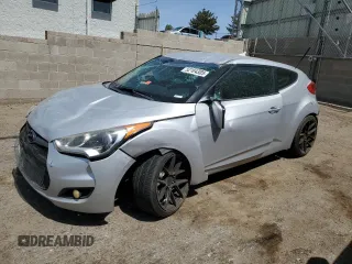 2016 Hyundai Veloster z VIN KMHTC6AD5GU267349, wystawiony jako Copart lot #52104305 z przebiegiem 106 039 mil mil oraz Szkody całkowita. Historia ofert i sprzedaży dostępna na DreamBid. Obrazek 1.