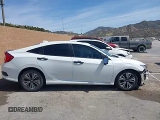 2017 Honda Civic Sedan EX-T with VIN 2HGFC1F36HH649299, listed as a IAAI auction lot 41847005 with 76,280 mi miles. Bid and sale history available at carsss.com. Image 13.