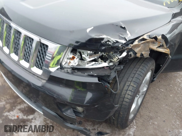 2013 Jeep Grand Cherokee Overland with VIN 1C4RJFCG1DC593890, listed as a IAAI auction lot 41264434 with 204,324 mi miles. Bid and sale history available at carsss.com. Image 6.