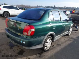 2002 Toyota ECHO with VIN JTDBT123620241321, listed as a IAAI auction lot 41334789 with NaN miles. Bid and sale history available at carsss.com. Image 4.