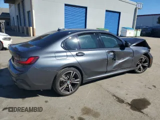 2022 BMW 3 Series 330i with VIN 3MW5R1J01N8C26963, listed as a Copart auction lot 45590415 with 37,441 mi miles and Salvage Title. Bid and sale history available at carsss.com. Image 3.