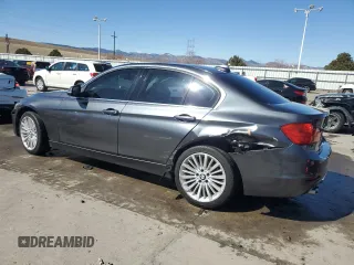 2015 BMW 3 Series 328i xDrive with VIN WBA3B3C50FF548227, listed as a Copart auction lot 48989675 with 80,410 mi miles and Salvage Title. Bid and sale history available at carsss.com. Image 2.