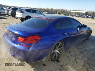2014 BMW M6 z VIN WBS6C9C51ED466736, wystawiony jako Copart lot #45031575 z przebiegiem 119 202 mil mil oraz Szkoda całkowita • Salvage title. Historia ofert i sprzedaży dostępna na DreamBid. Obrazek 3.