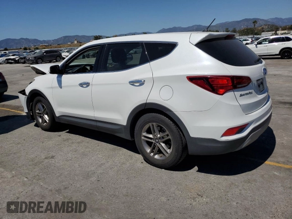 2018 Hyundai Santa Fe 2.4L with VIN 5NMZT3LB3JH095801, listed as a Copart auction lot 56068565 with 82,616 mi miles and Salvage title. Bid and sale history available at DreamBid. Image 2.