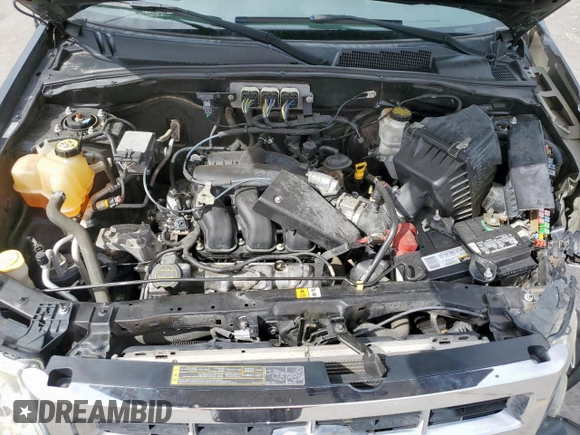 2008 Ford Escape Limited z VIN 1FMCU04138KB77500, wystawiony jako Copart lot #51249415 z przebiegiem 106 667 mil mil oraz Szkoda całkowita • Salvage title. Historia ofert i sprzedaży dostępna na DreamBid. Obrazek 11.