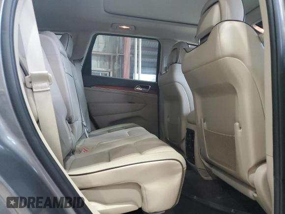 2013 Jeep Grand Cherokee Overland with VIN 1C4RJECT6DC526032, listed as a Copart auction lot 55660905 with 97,406 mi miles and Salvage Title. Bid and sale history available at DreamBid. Image 11.