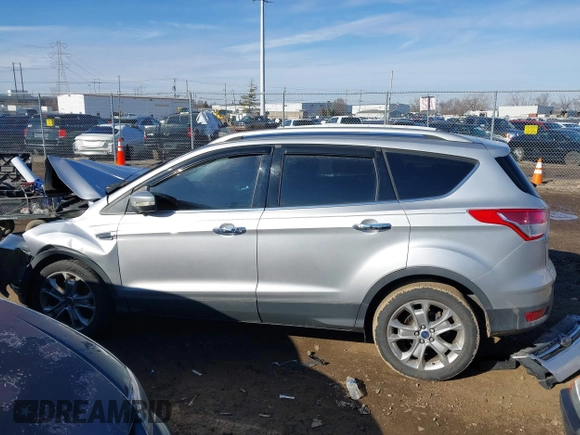 2015 Ford Escape Titanium with VIN 1FMCU0J93FUC02844, listed as a IAAI auction lot 41531293 with 115,392 mi miles and . Bid and sale history available at DreamBid. Image 15.